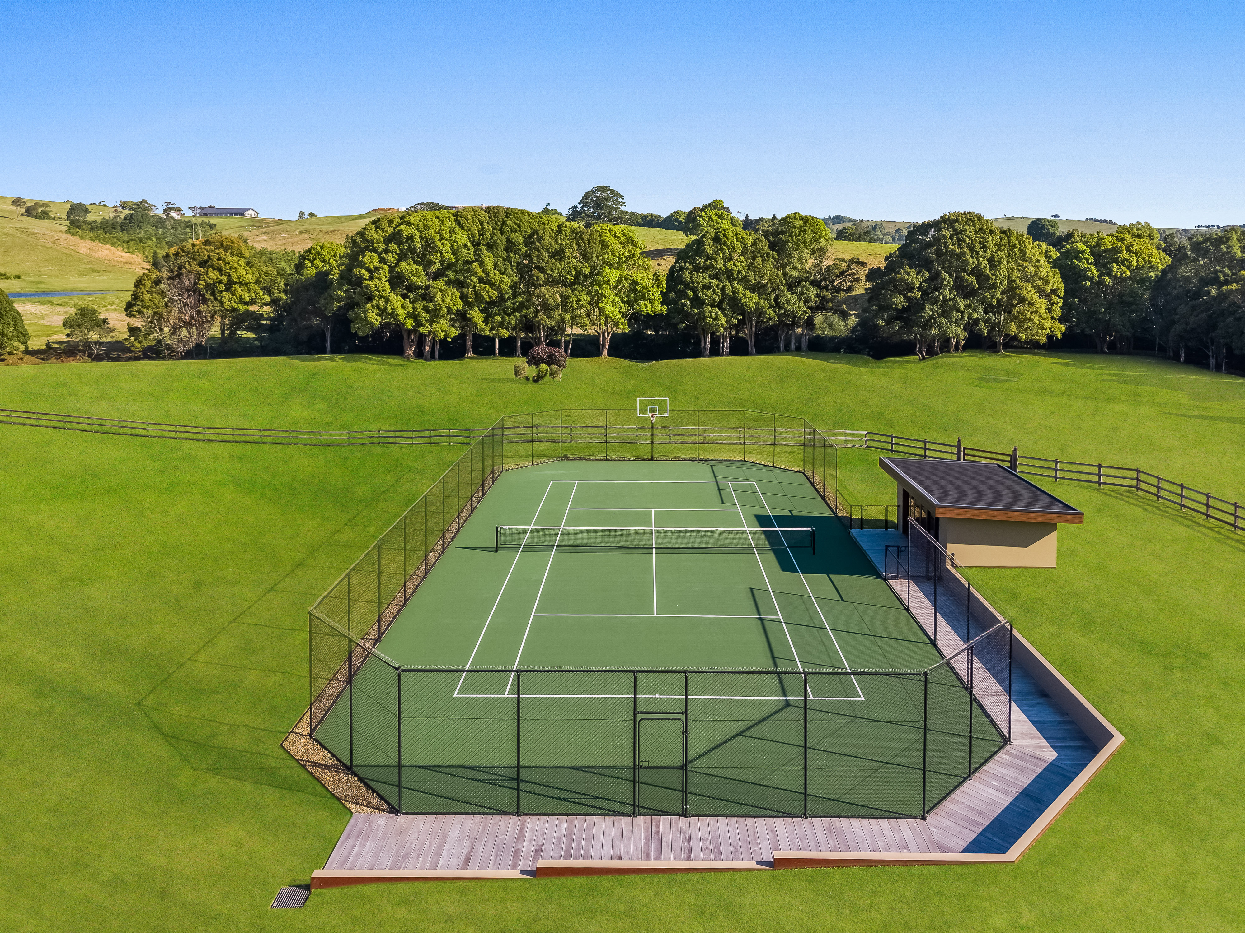 Drone photography of tennis court and pavilion on acreage — aerial real estate photography Northern Rivers